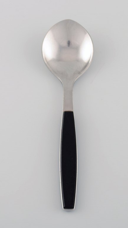 Henning Koppel for Georg Jensen. Strata dessert spoon in stainless steel and 
black plastic. 1960s / 70