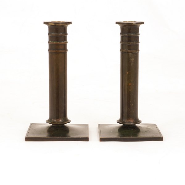 A pair of Just Andersen bronze candlesticks. #B154. H: 18cm