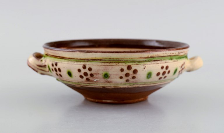 Gutte Eriksen (1918-2008), own workshop. Ear bowl with handles in glazed 
stoneware. Danish design, mid 20th century.
