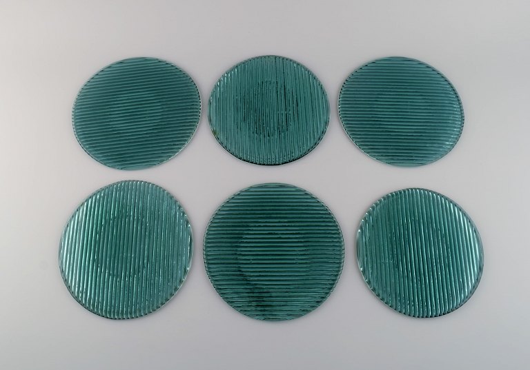 Per Lütken for Holmegaard. Seks "Buffet" tallerkener i blågrønt mundblæst 
kunstglas. 1980