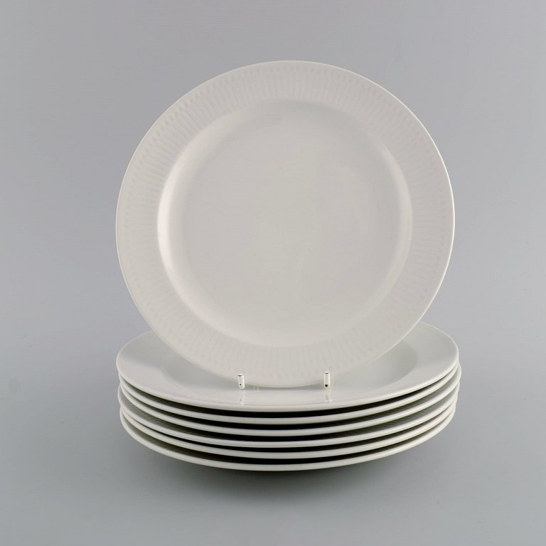 Seven Rörstrand porcelain plates. Swedish Grace. Mid 20th century.
