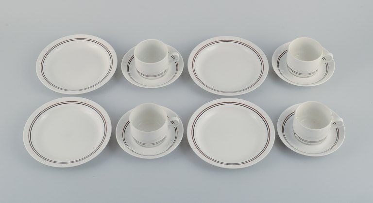 Rörstrand coffee service for four people. Swedish design, 1960s.
Consisting of four coffee cups with saucers and four plates in glazed 
porcelain.