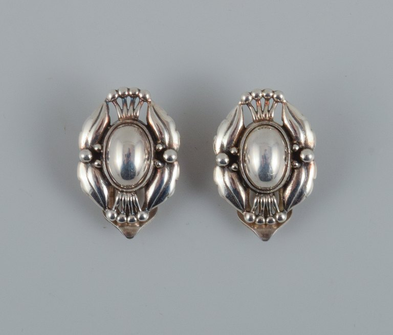 A pair of Georg Jensen ear clips in sterling silver.
Jewelery of the year 2000.
