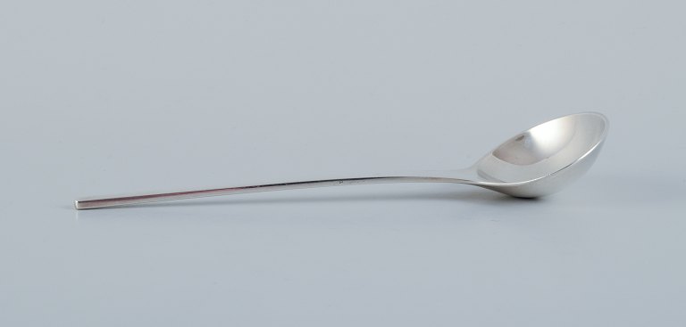 Georg Jensen, Caravel, a serving spoon in sterling silver. Modernist and sleek 
design.