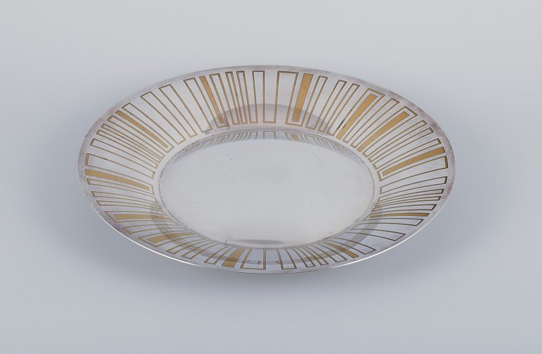 WMF, Germany. Large "Ikora" Art Deco bowl with three feet, silver-plated with brass inlay.