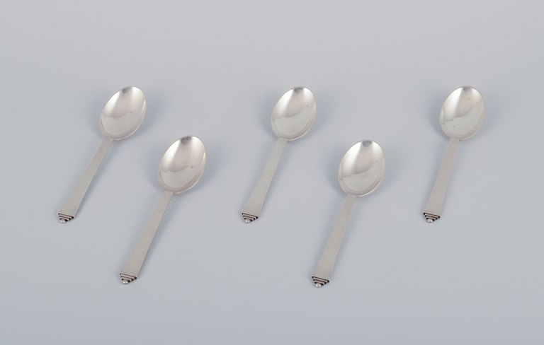 Georg Jensen Pyramid, five dessert spoons in sterling silver.