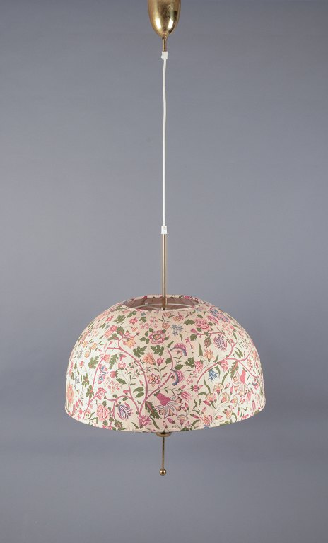 Hans-Agne Jakobsson for A/B Markaryd.
Ceiling lamp in brass, shade in floral-patterned fabric.