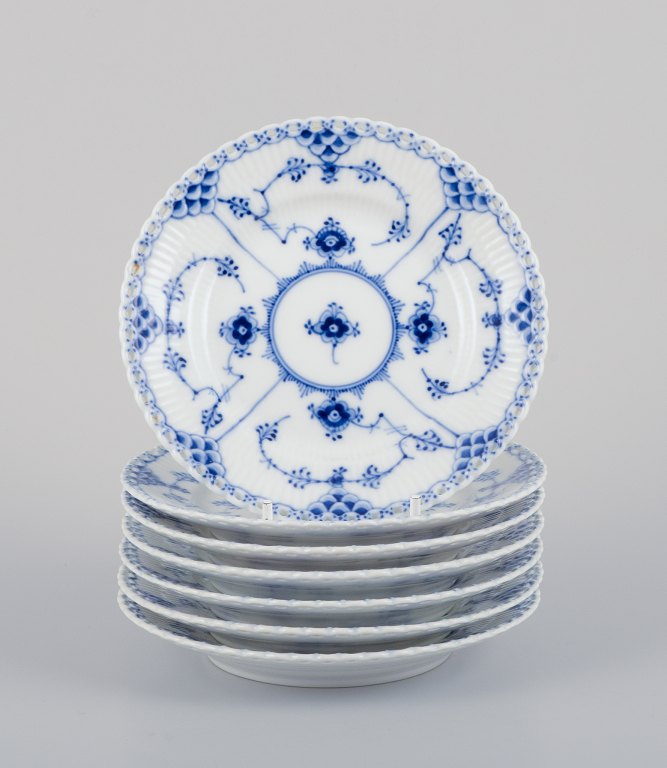 Royal Copenhagen Blue Fluted Half Lace, a set of seven plates.