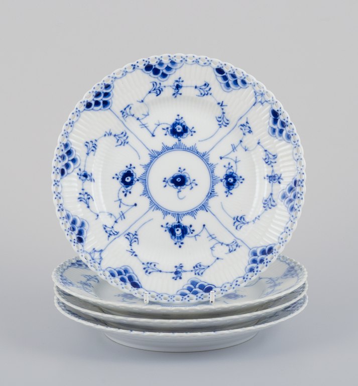 Royal Copenhagen Blue Fluted Half Lace, a set of four small lunch plates.