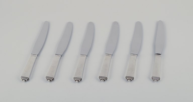 Georg Jensen Pyramid, a set of six short-handled dinner knives in sterling 
silver.