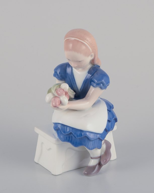 Bing & Grondahl, Denmark.
Porcelain figurine of a seated girl.