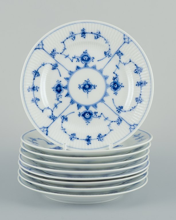 Royal Copenhagen Blue Fluted Plain, nine dessert plates in hand-painted 
porcelain.