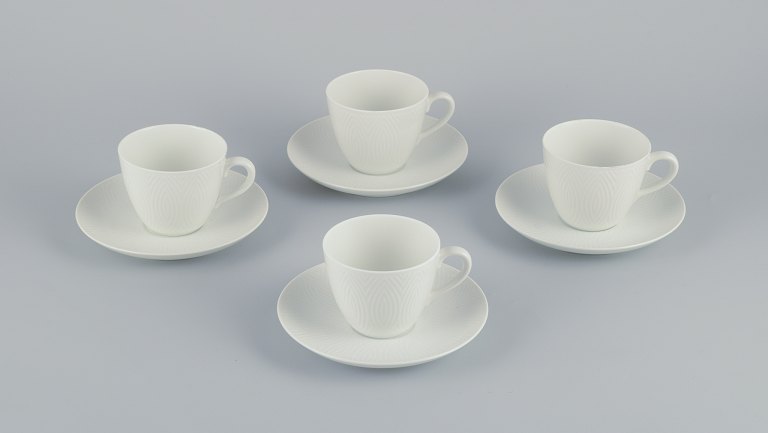 Axel Salto for Royal Copenhagen. Four pairs of coffee cups in white porcelain.