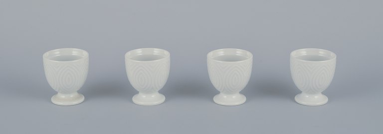 Axel Salto for Royal Copenhagen. Four egg cups in white porcelain.