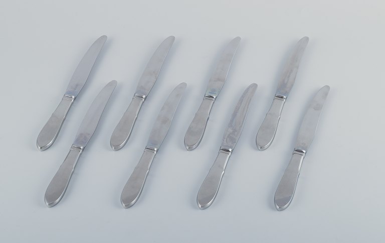 Gundorph Albertus for Georg Jensen.
Eight "Mitra" dinner knives in stainless steel.
