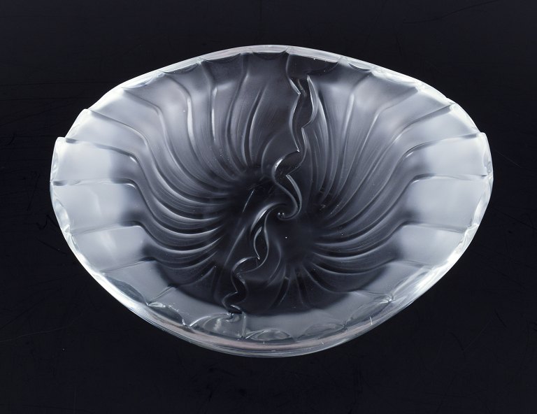 Lalique, France. 
Art glass bowl with relief decoration.