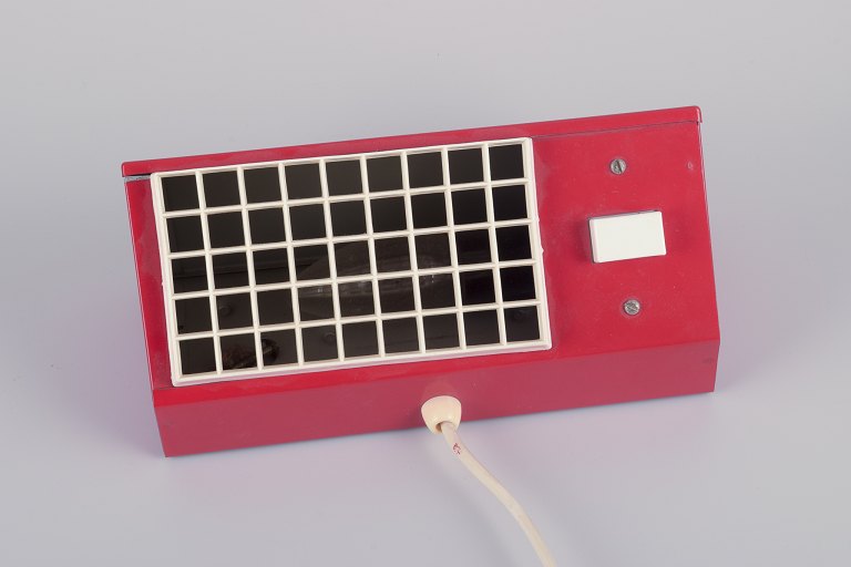 Hans-Agne Jakobsson, Sweden.
"Elidus" bedside lamp in red-lacquered metal.