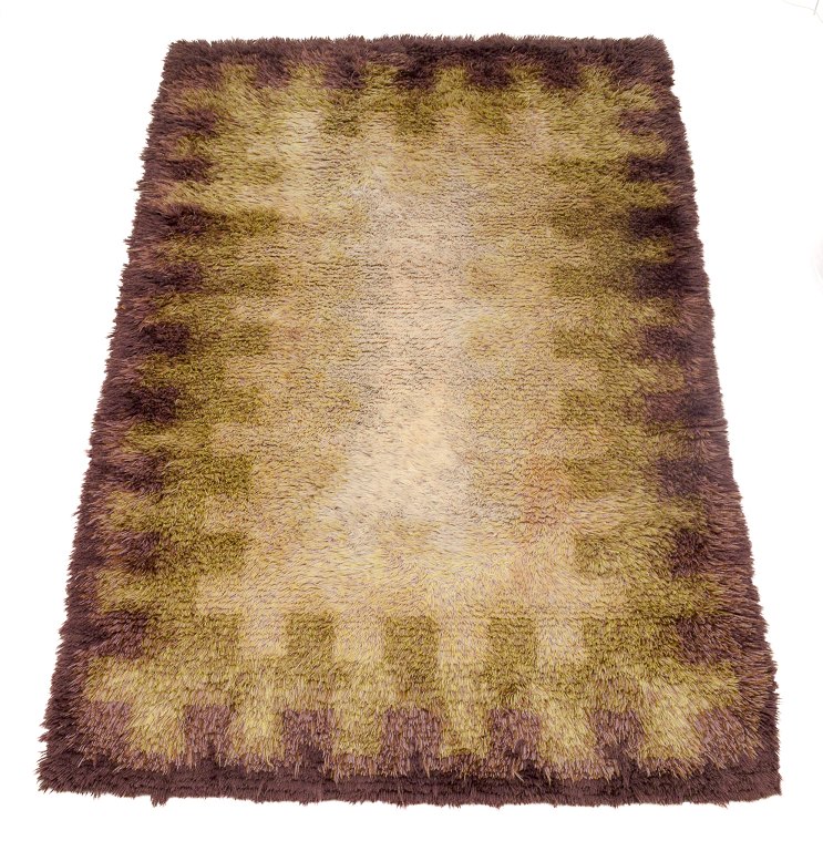 Scandinavian textile artist.
Cotton rya rug.
Brown yellow and white colors.