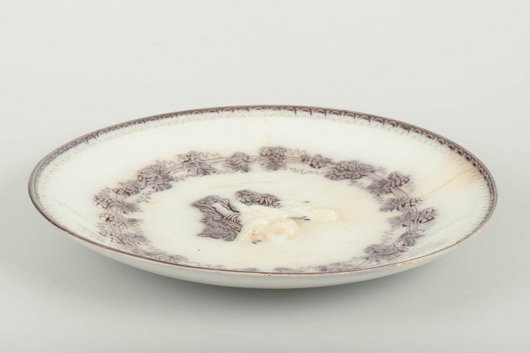 GeflePlate “Mullbär” with putti figures, c. 1880/90s.