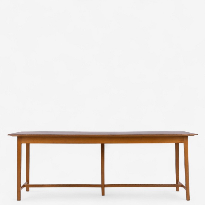 Attributed to Thorald Madsen
Work table with elm frame and teak top with fluted bottom edge. Made in the 
1950s.
1 pc. in stock
