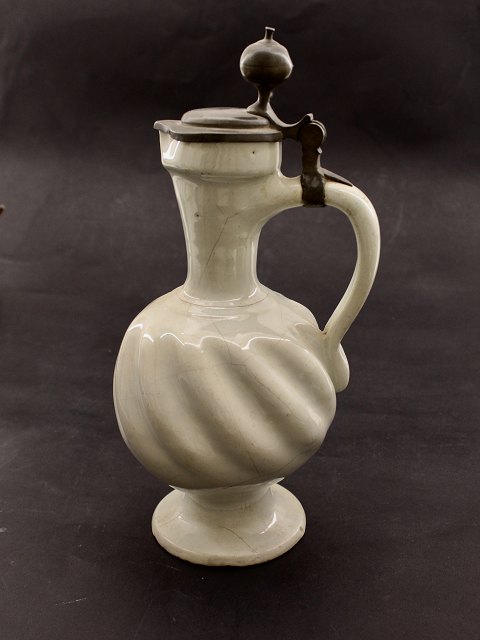 Faience wine jug with tin lid