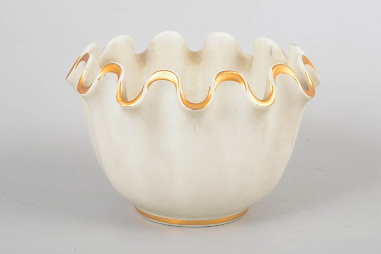 Wilhelm Kåge for Gustavsberg, flower pot holder model Carrara with gold decor.