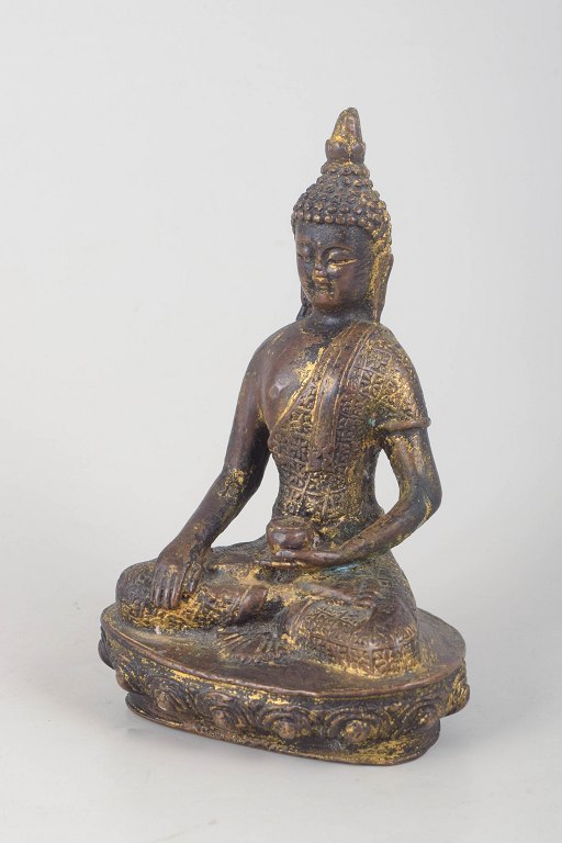 Buddhafigur i forgyldt bronze.